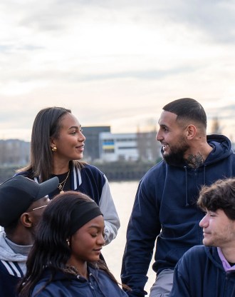 Group of students from the INSEEC business school chatting along the Garonne River