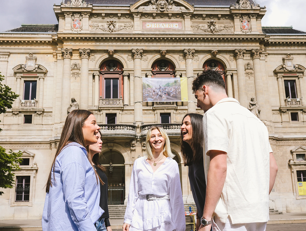 Group of students from the INSEEC business school laughing in front of the