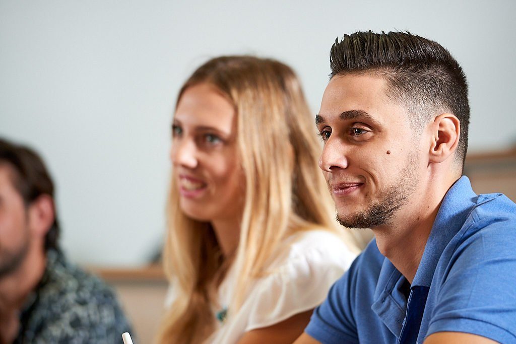 and students listening in human resources classes.